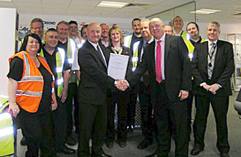 Mike James, LRQA (left) presenting the OHSAS 18001 certificate to David Hunter - Managing Director, Antalis UK (right) and the Antalis team.